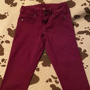 Maurices red skinny jeans